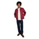 A man modeling a burgundy utility jacket over a white t-shirt, dark blue jeans, and brown leather shoes, standing against a solid white background.