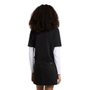 Person wearing a black shirt with white sleeves and a black skirt on a white background