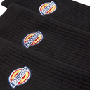 Close-up of a black ribbed knit sock with three embroidered circular Dickies logos spaced vertically along the side.