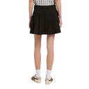 Person wearing a black pleated skirt on a white background