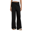 Person wearing black wide-leg pants on a white background