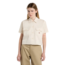 Woman wearing a beige short-sleeve shirt with a collar on a white background