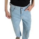 Light blue jeans worn by a person on a white background