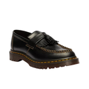 Black loafer shoe with brown stitching on a white background