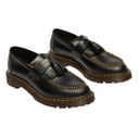 Pair of black loafers with tassels on a white background
