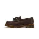 Dark brown Dr. Martens leather tassel loafer with a colorful buckle on a white background