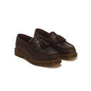 A pair of dark brown leather tassel loafers with classic welt stitching and yellow stitching along the sole, shown on a plain white background.