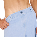 Light blue denim shorts worn by a person on a white background