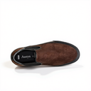 A single brown suede slip-on shoe shown from a top-down angle on a white background, with a black inner lining and the brand name Austyn visible on the insole.