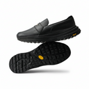 Black slip-on shoes with yellow accents on a white background