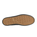 Close-up of a shoe sole with tread pattern on a white background