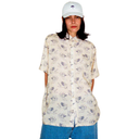 Person wearing a patterned shirt and white cap on a white background