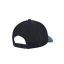 A dark navy blue trucker-style cap shown from a rear three-quarter angle, featuring a dark mesh back, contrast orange stitching, and a light blue patterned visor.