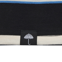 Close-up of a striped fabric with a logo on a black background