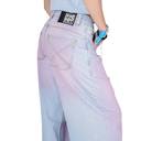 Gradient blue and pink jeans with a visible brand label on a white background