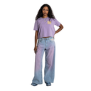 Woman wearing a purple t-shirt and gradient jeans on a white background