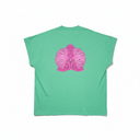 Green sleeveless shirt with pink orchid design on the back, worn by a person.