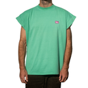 Person wearing a green t-shirt with a small logo on a white background