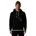 A man wearing a black hoodie with a beige interior lining, a matching black crossbody bag across his chest, and a brown beanie, shown against a plain white background.