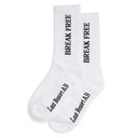 A pair of white crew socks with black text, featuring 'BREAK FREE' printed vertically on the upper leg and 'Last Resort A/B' printed on the foot, shown against a plain white background.
