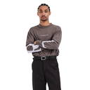A man modeling a dark brown long-sleeve crewneck sweatshirt with white graphic accents on the sleeves and a small white logo on the chest, paired with black pants and a black belt, against a plain white background.