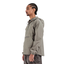 A man shown in profile wearing a light gray hooded pullover jacket with a half-zip front, elastic cuffs, and a front pocket, against a plain white background.