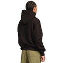 A person shown from the back wearing a black pullover hoodie and olive green pants, photographed against a plain white background.