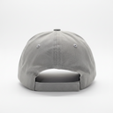 A light gray baseball cap shown from the back, featuring a stitched fabric crown, ventilation eyelets, and an adjustable hook-and-loop strap closure.