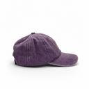 Black cap with embroidered designs on a white background