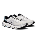 White running shoes with black accents on a white background