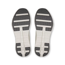 Top view of a pair of shoes with a white sole and black tread pattern on a white background