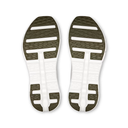 Top view of a white shoe sole with green and white pattern on a white background