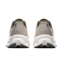 Pair of gray running shoes with white soles on a white background