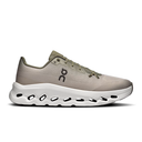 Beige running shoe with white sole on a white background