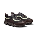 A pair of dark brown and black athletic sneakers with a distinctive wavy light beige side stripe and a chunky, textured dark sole, shown on a clean white background.