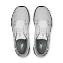 Gray athletic shoes with white soles on a white background