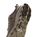 Brown hiking shoe with camouflage sole on a white background