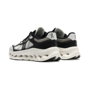 Black and white sneakers with 'On' branding on a white background
