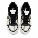 Black and white sneakers with brand logo on a white background