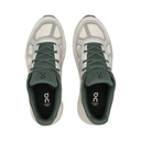 Pair of green and white sneakers on a white background