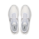 White athletic shoes with visible brand logo on a white background