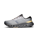 A light gray and dark gray running shoe with black accents and a small gold accent near the heel, shown in a side profile on a white background.