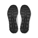 A pair of black athletic shoes shown from a top-down view, highlighting their textured, treaded rubber soles against a plain white background.