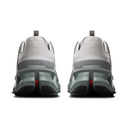 Gray running shoes with visible 'on' logo on a white background