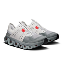 Gray athletic shoes with red accents on a white background