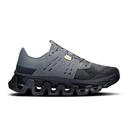 Gray athletic shoe with unique sole design on a white background