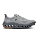 Gray athletic shoe with a unique sole design on a white background