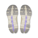 Close-up of a pair of shoe soles with purple arch supports on a white background