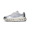 A light gray and white running shoe with a thick, sculpted white midsole featuring circular cutouts, shown from a side profile on a white background.