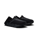 A pair of black slip-on mesh athletic shoes with chunky black soles, displayed on a clean white background with a soft shadow.
